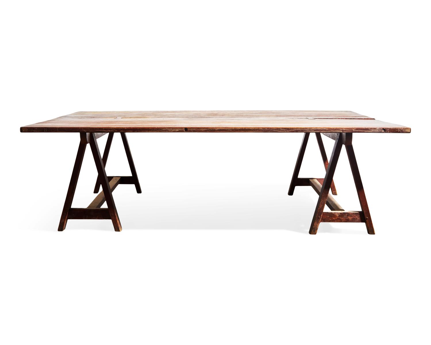A Large Walnut Sawbuck Table