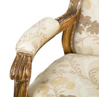 A Pair of Louis XV Style Giltwood Fauteuils — 19TH CENTURY