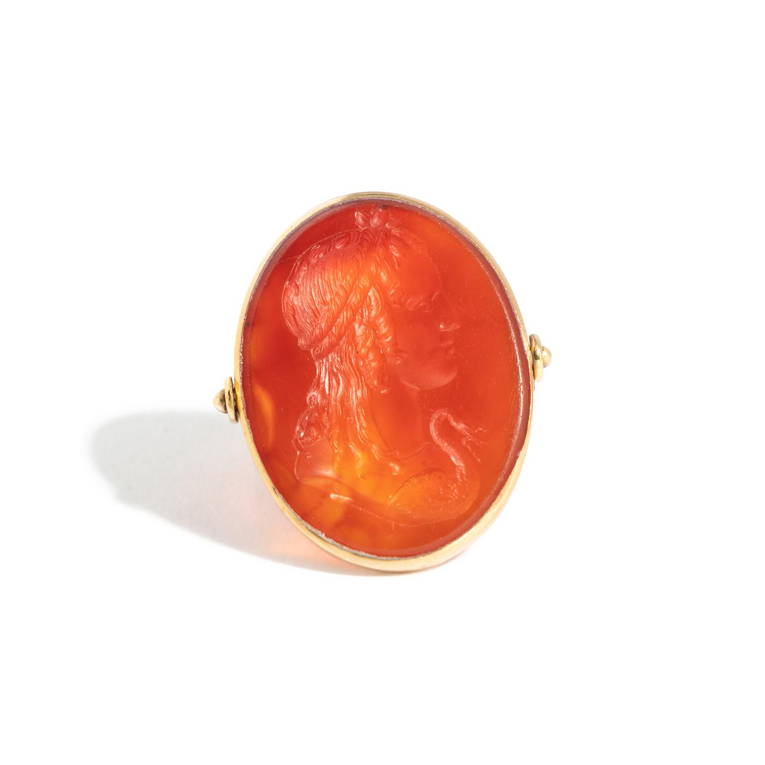 A Neoclassical Gold and Carnelian Swivel Ring with the Princess Leda