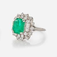 A Platinum, Emerald, and Diamond Ring