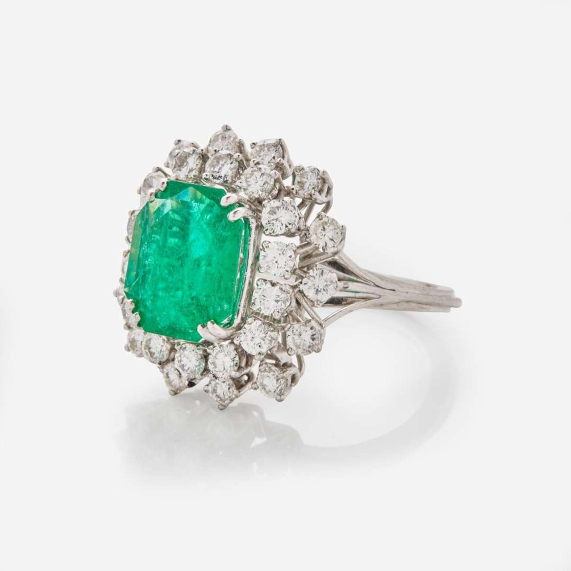 A Platinum, Emerald, and Diamond Ring