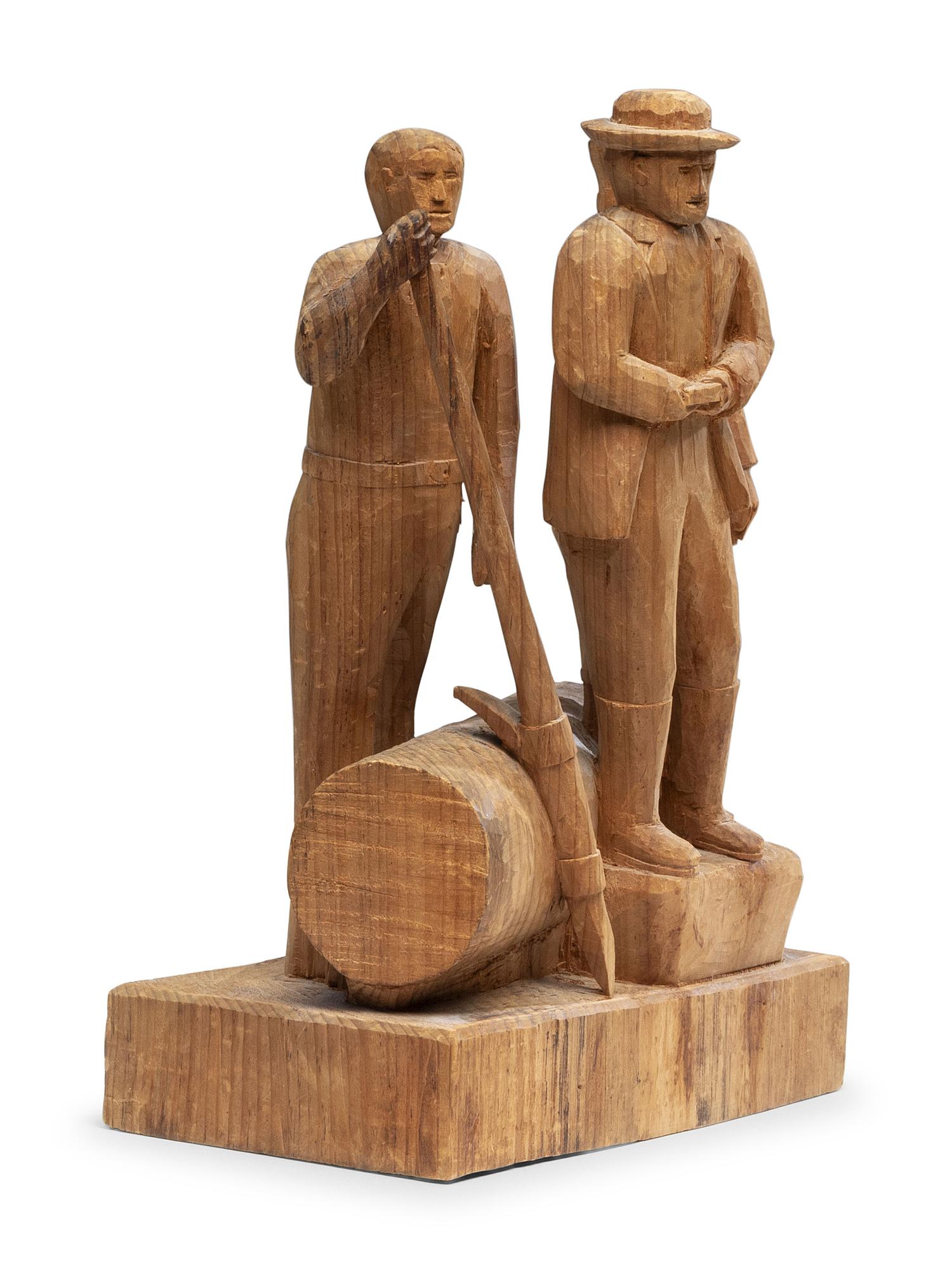 A Folk Art Carved Pine Group of Lumberjacks