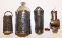 A Collection of Nutmeg Graters Length of longest 6 1/2 inches.