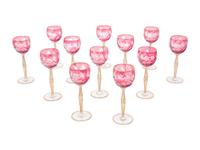 A Set of Twelve Bohemian Etched and Gilt Decorated Red Cut-to-Clear Wine Stems