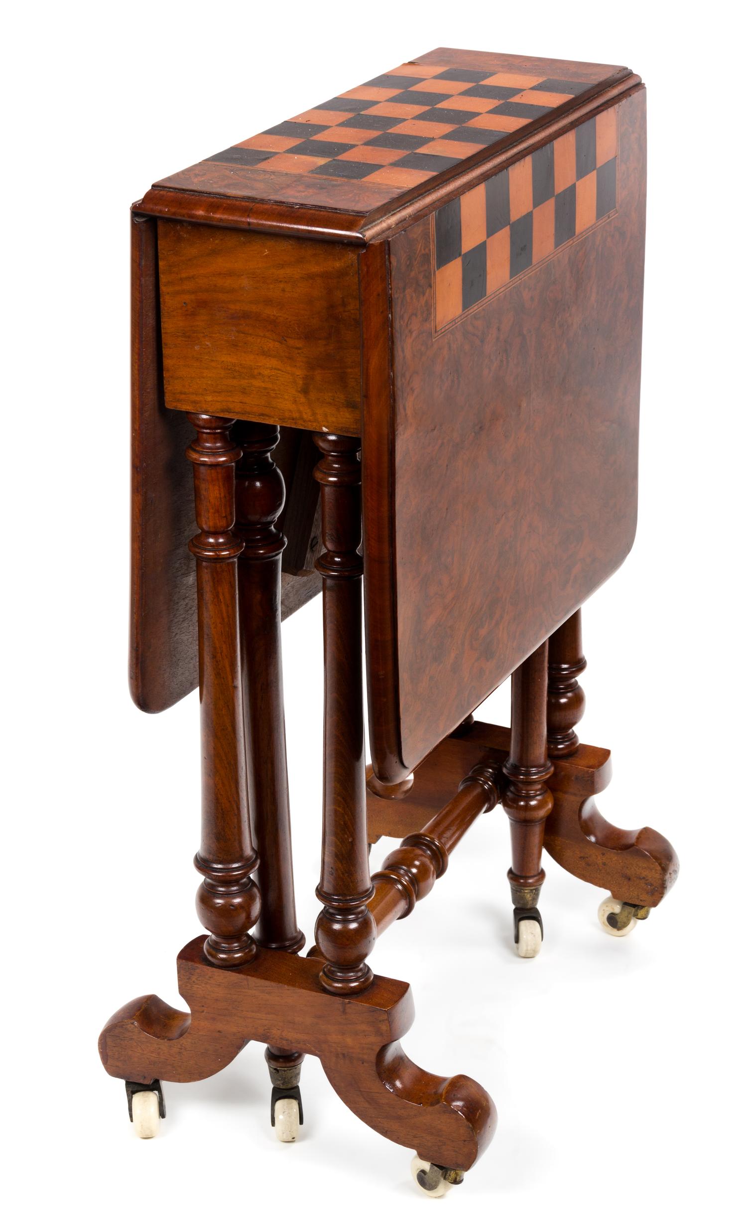 A Late Victorian Walnut Games Table Height 27 1/2 x width 34 1/4 x depth 18 inches. — LATE 19TH CENTURY