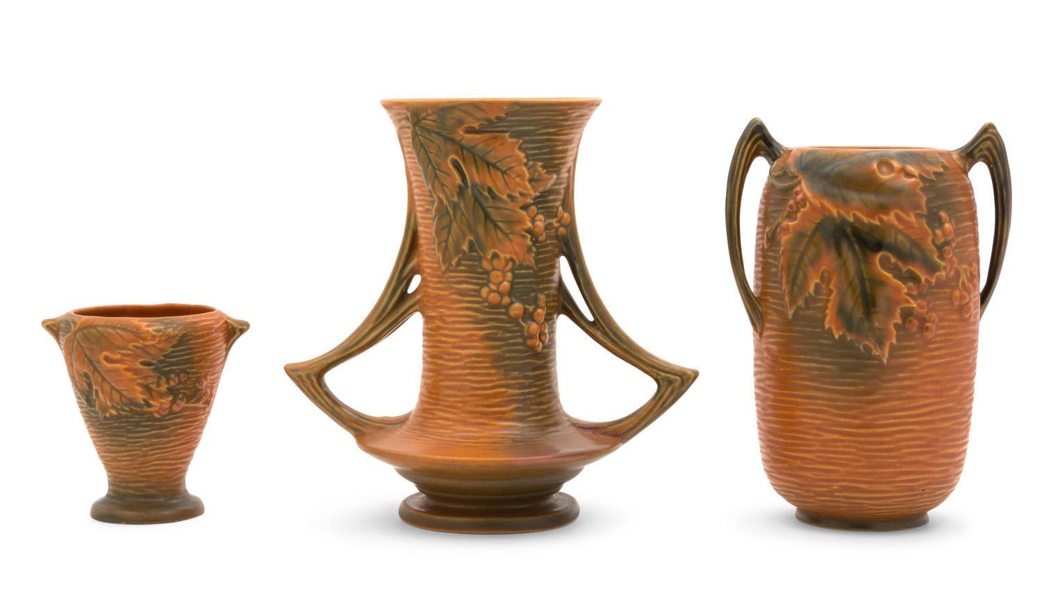 Three Roseville Bushberry Pottery Vases Height of tallest 8 1/2 inches.