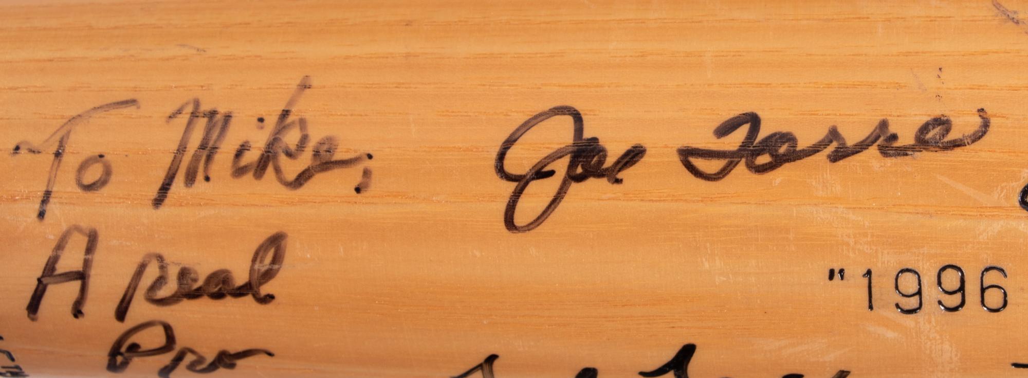 A Group of Baseball Bats Formerly Displayed at Mike Ditka's Restaurant (Including Ken Griffey Jr. and Hank Aaron Signed),