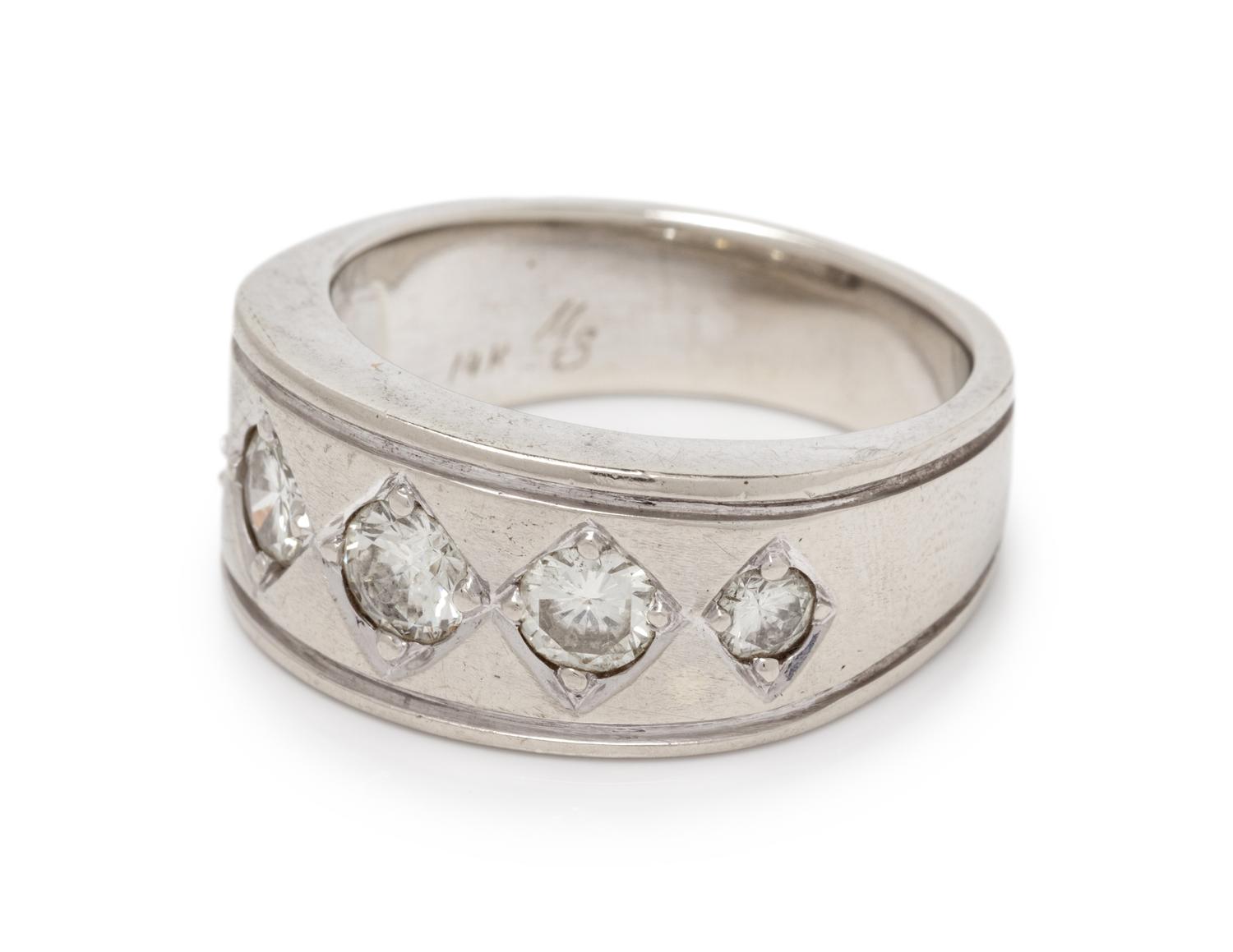 A 14 Karat White Gold and Diamond Ring,