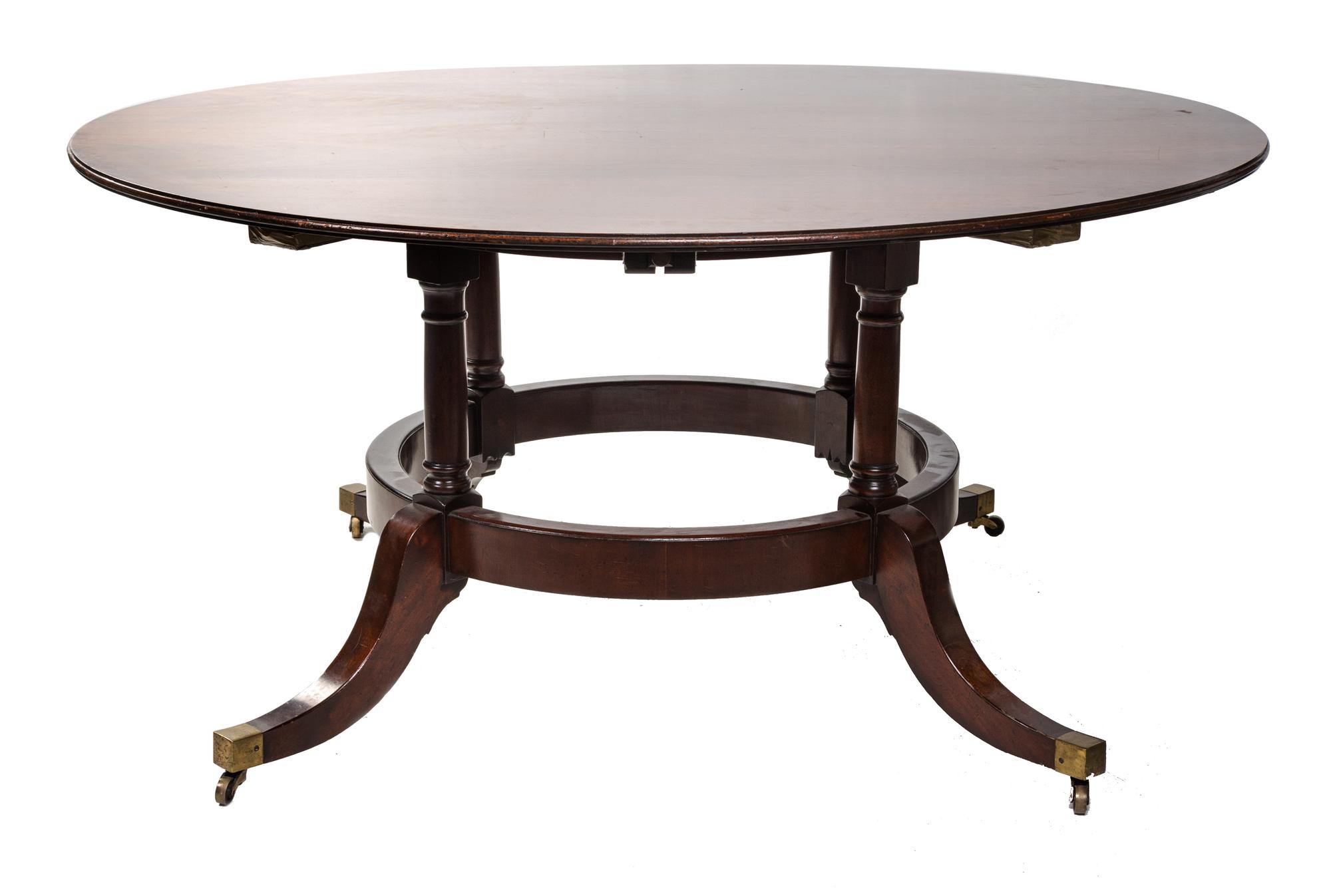 A Regency Style Mahogany Dining Table Diameter 60 inches. — 20TH CENTURY