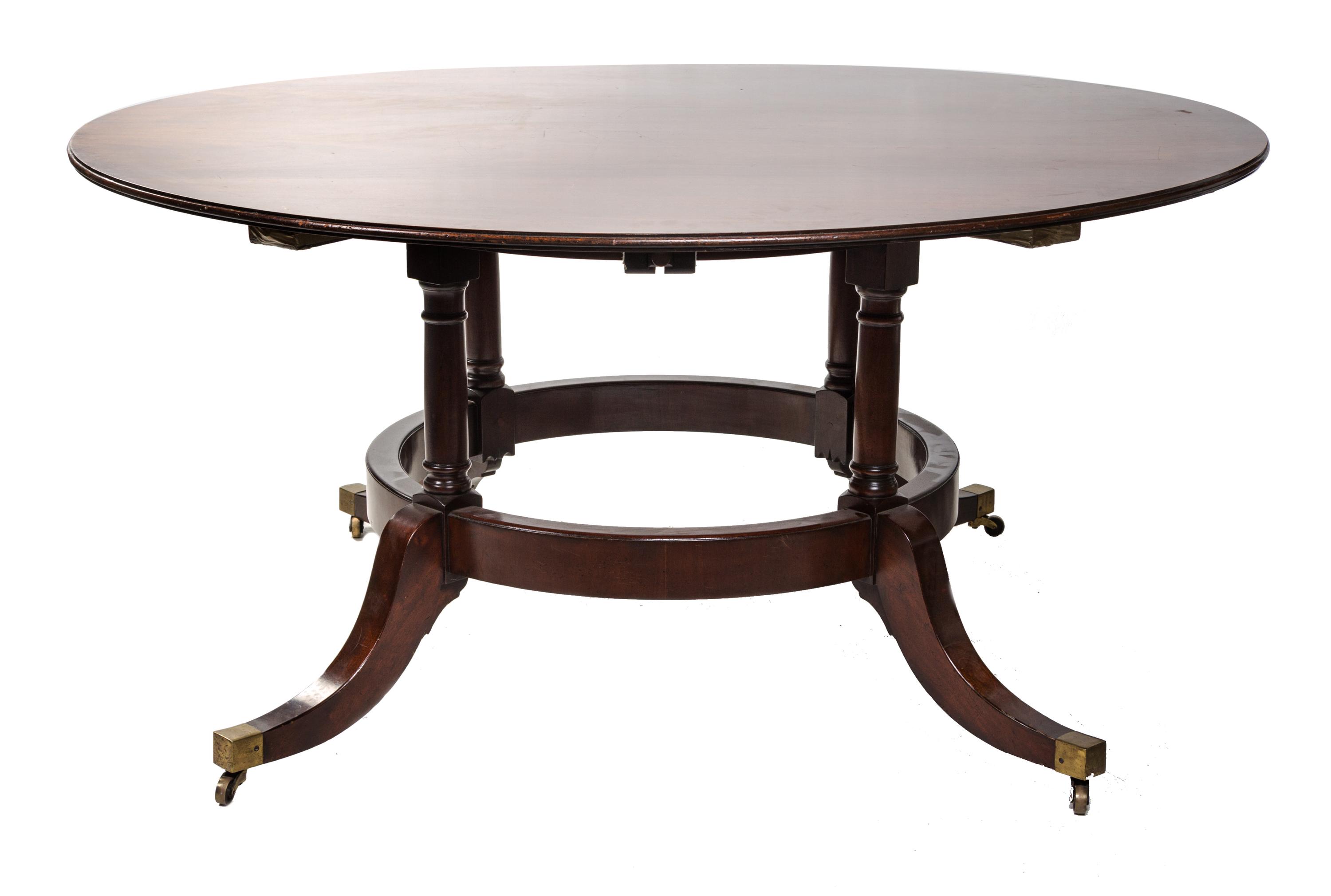 A Regency Style Mahogany Dining Table Diameter 60 inches. — 20TH CENTURY