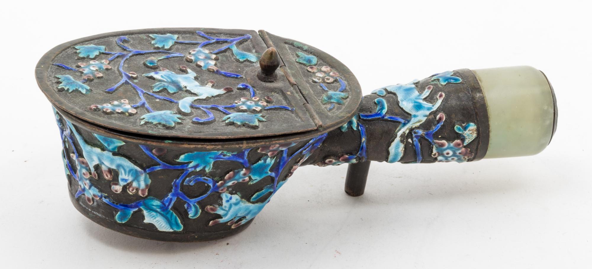 An Enamel on Copper Iron Length 7 1/4 inches.