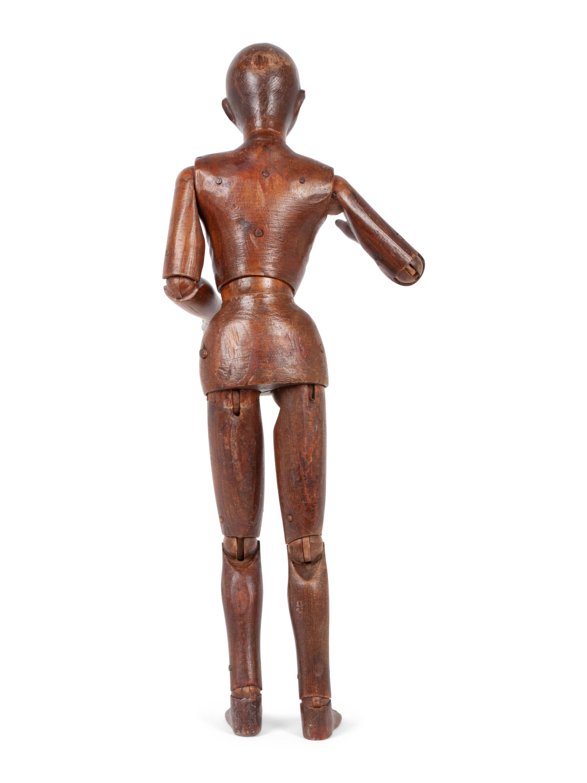 An Articulated Carved Wood Artist's Model