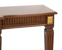 A Louis XVI Style Parcel Gilt Mahogany Console Table