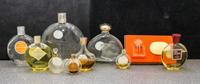 Nine Lalique and Other Perfume Bottles. Height of tallest 5 1/2 inches.
