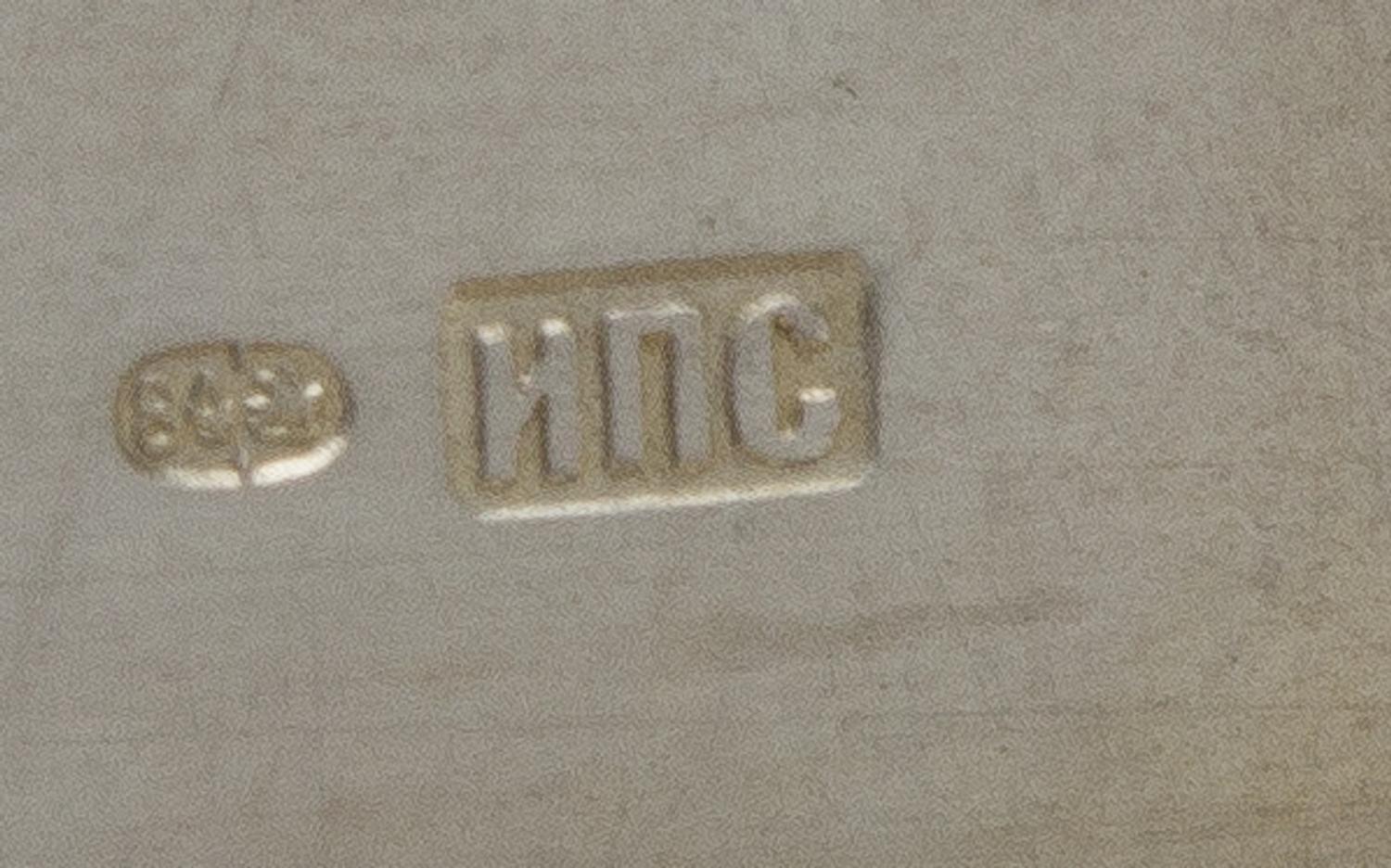 A Russian Silver Cigarette Case, Mark of Ivan Petrovich Speshnev, Moscow, Late 19th Century, the lid worked to show floral sprays and a