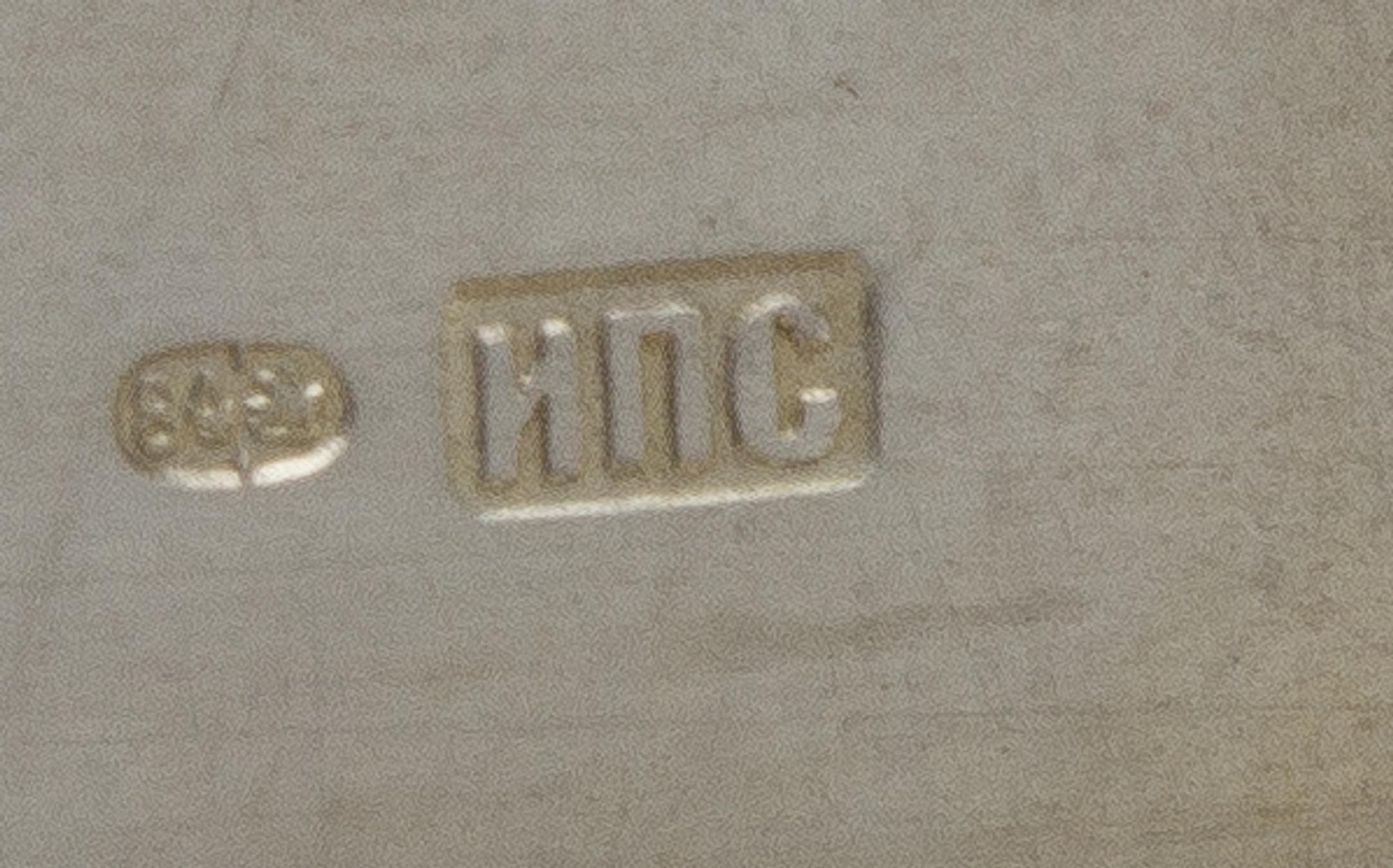 A Russian Silver Cigarette Case, Mark of Ivan Petrovich Speshnev, Moscow, Late 19th Century, the lid worked to show floral sprays and a
