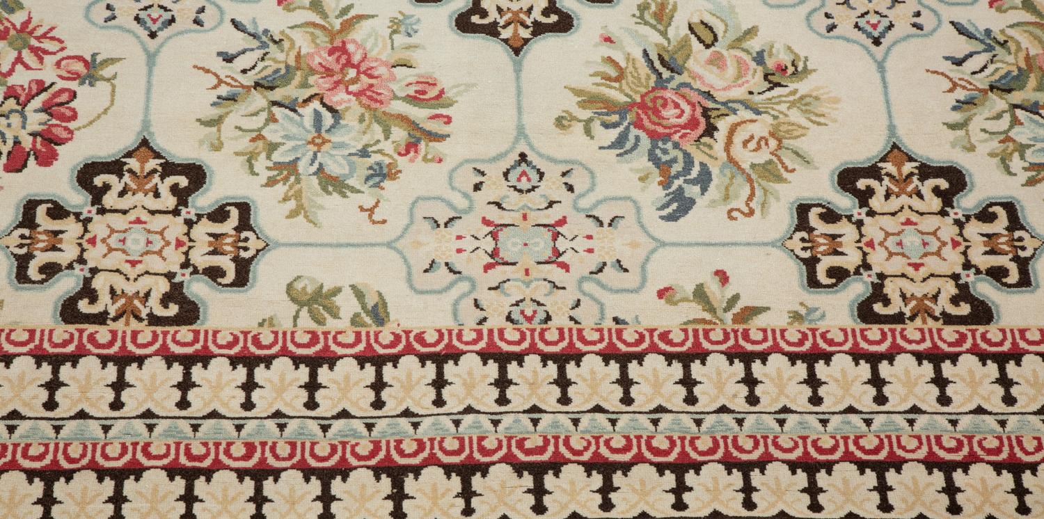 An Indian Floral Design Wool Rug