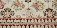 An Indian Floral Design Wool Rug