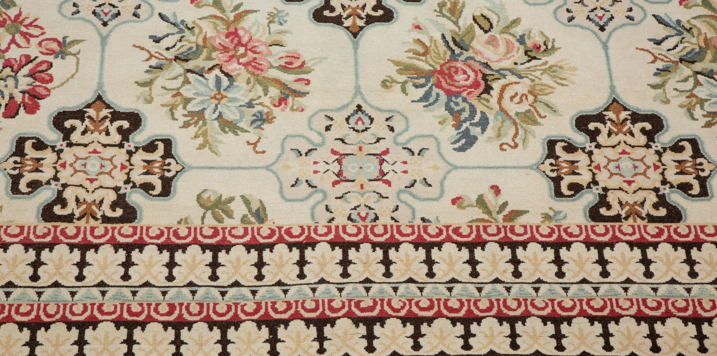 An Indian Floral Design Wool Rug