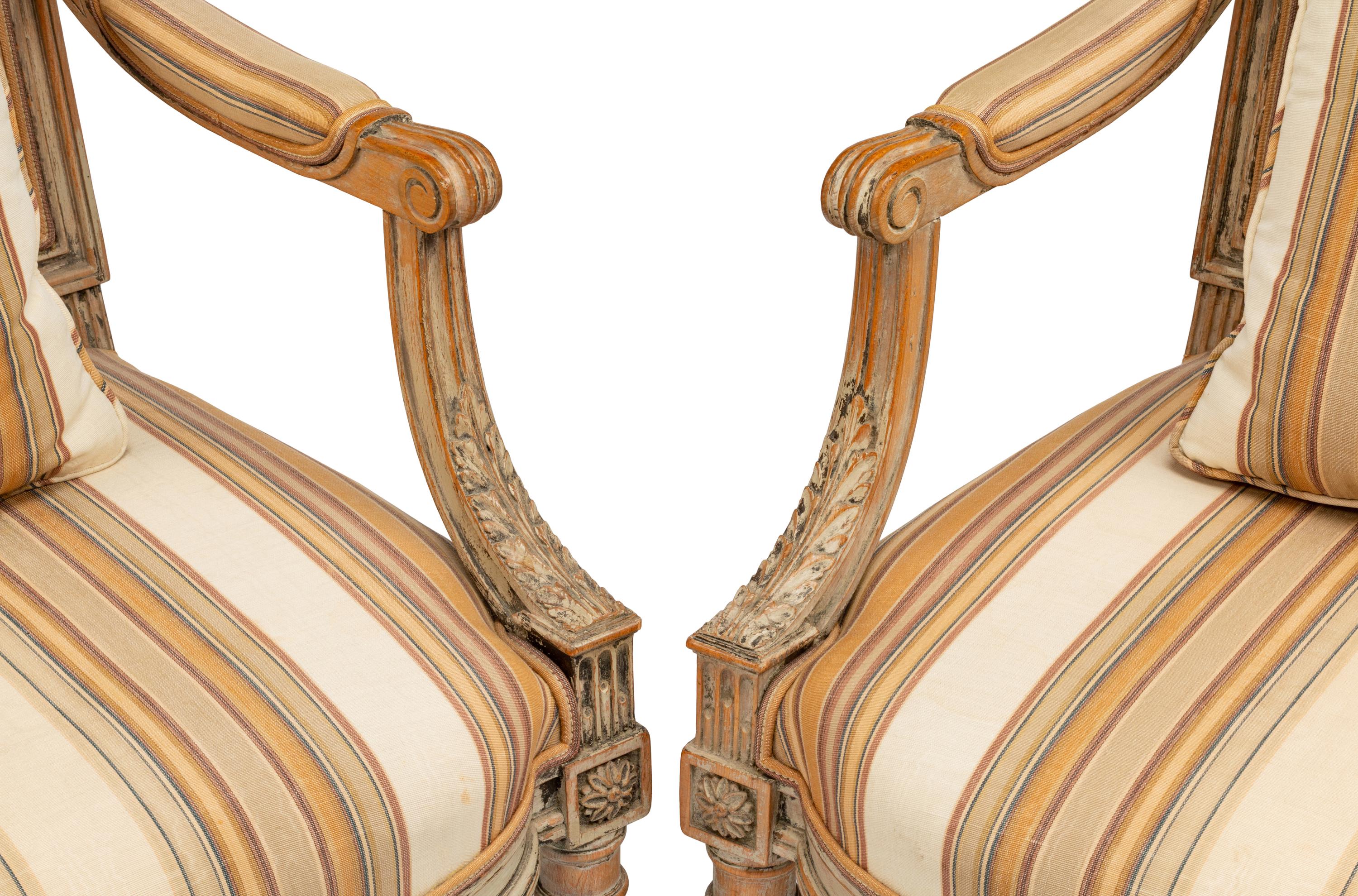 A Pair of Louis XVI Gray-Painted Fauteuils