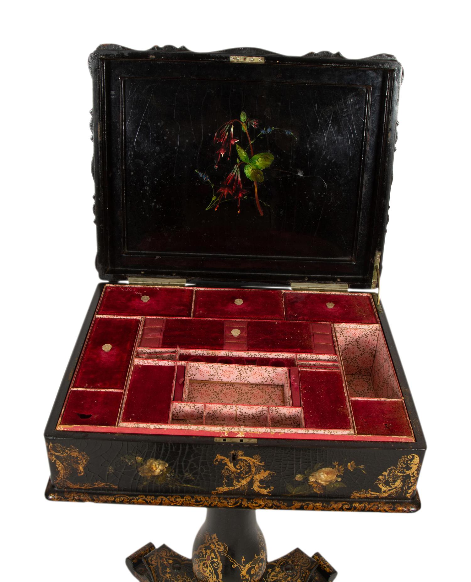 An English Victorian Black and Gilt Chinoiserie Sewing Table with Mother-of-Pearl Inlay