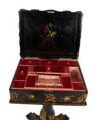 An English Victorian Black and Gilt Chinoiserie Sewing Table with Mother-of-Pearl Inlay
