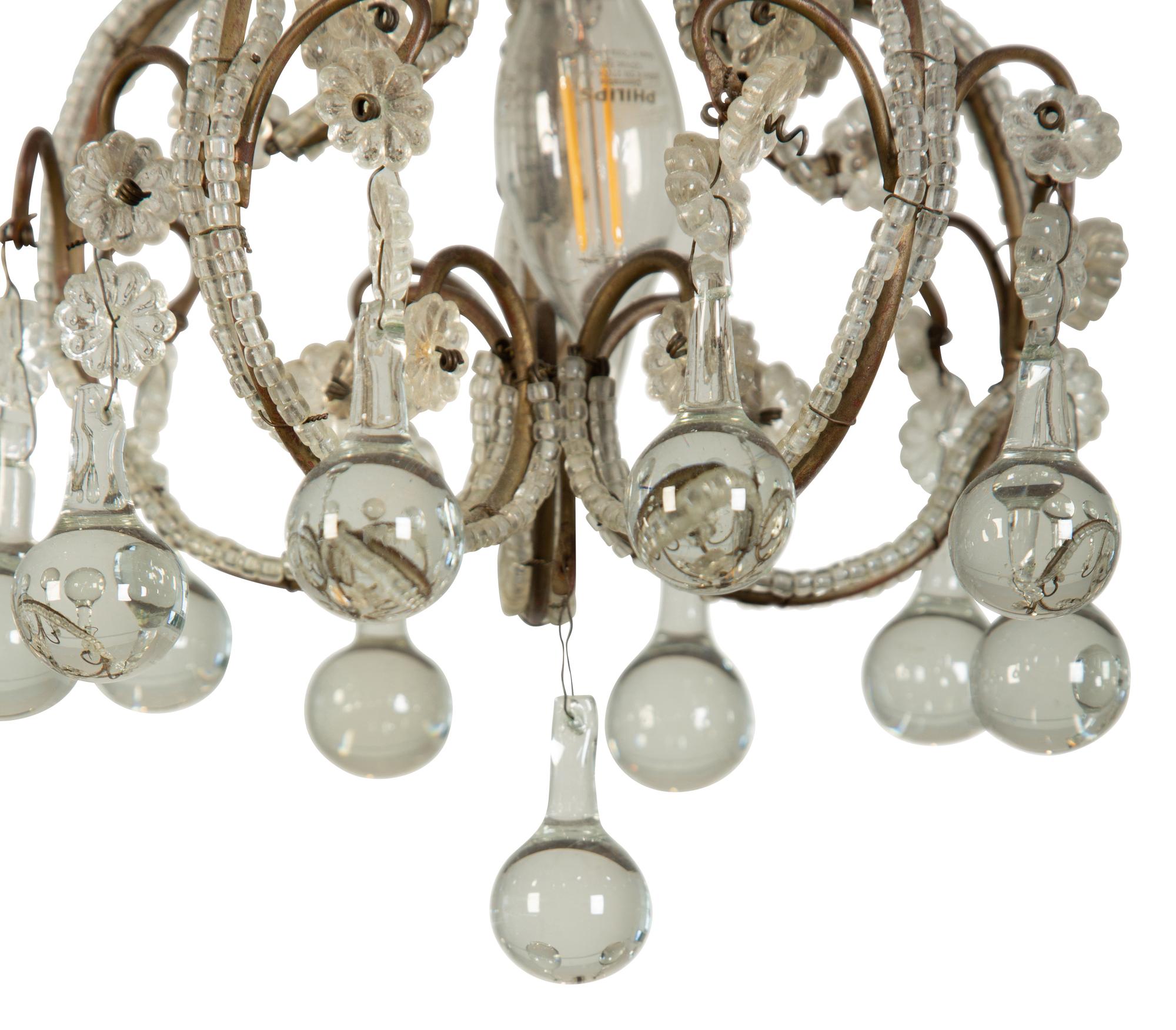 A Pair of Gilt Metal and Glass-Beaded Chandeliers
