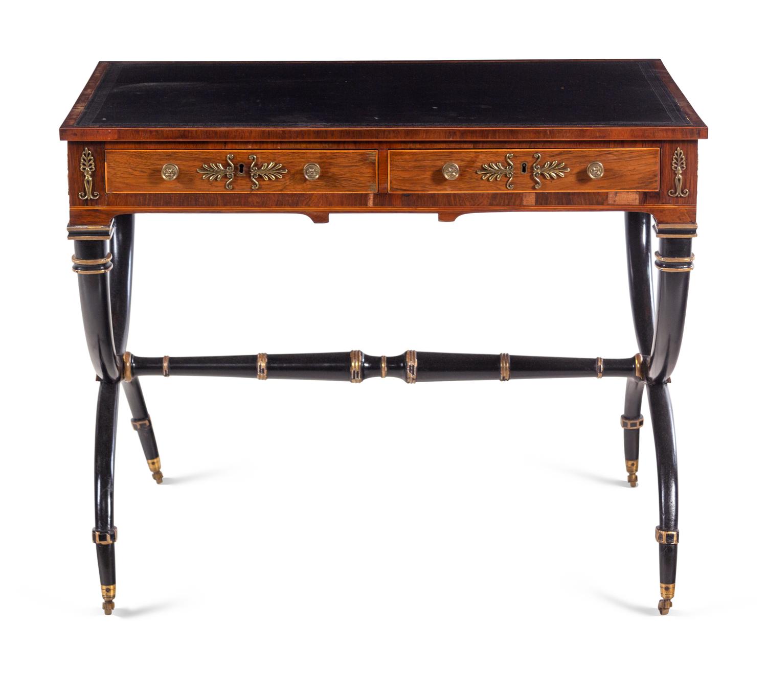 A Regency Gilt Bronze Mounted, Parcel Ebonized and Parcel Gilt Rosewood Writing Table