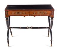 A Regency Gilt Bronze Mounted, Parcel Ebonized and Parcel Gilt Rosewood Writing Table