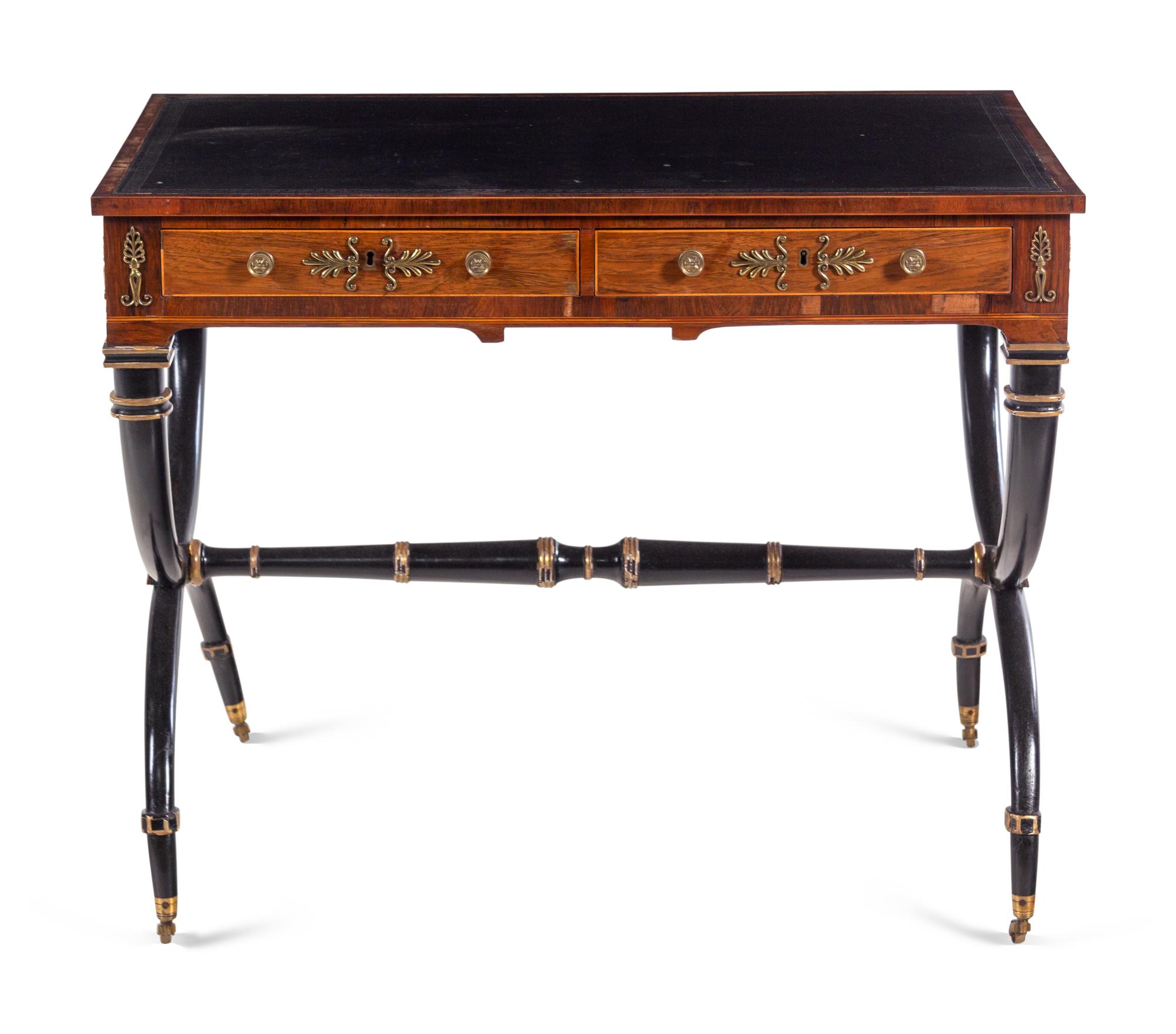 A Regency Gilt Bronze Mounted, Parcel Ebonized and Parcel Gilt Rosewood Writing Table