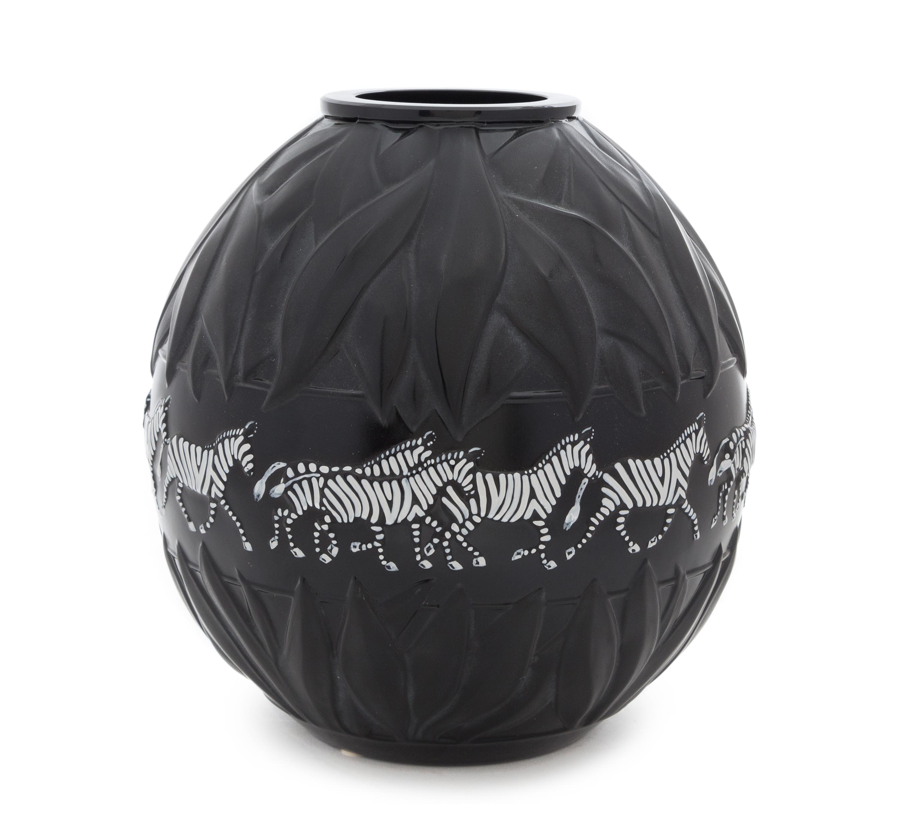 A Lalique Black Glass Tanzania Vase Height 9 inches.