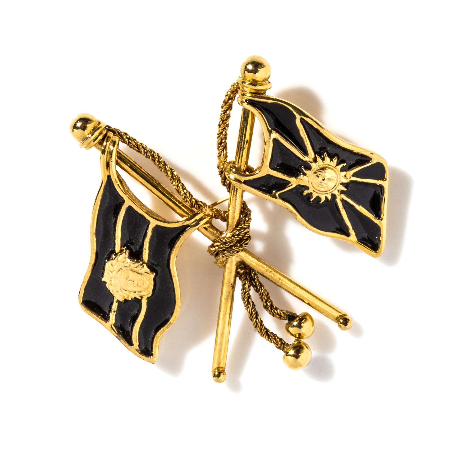 A Gianni Versace Black Enamel Flag Brooch, 3" x 2.75".