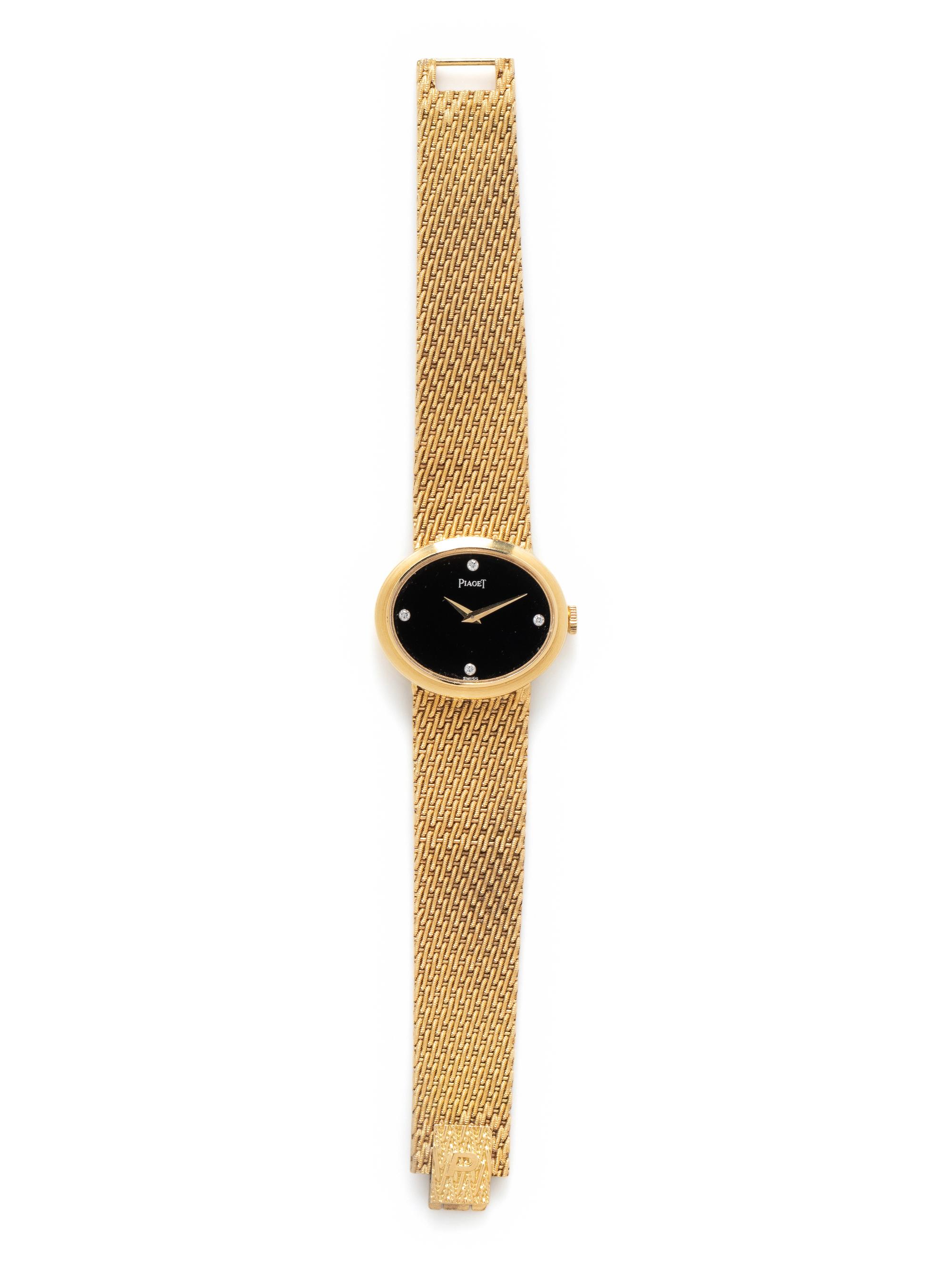 PIAGET, 18K YELLOW GOLD, DIAMOND AND ONYX WATCH