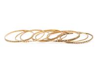 COLLECTION OF YELLOW GOLD BANGLE BRACELETS
