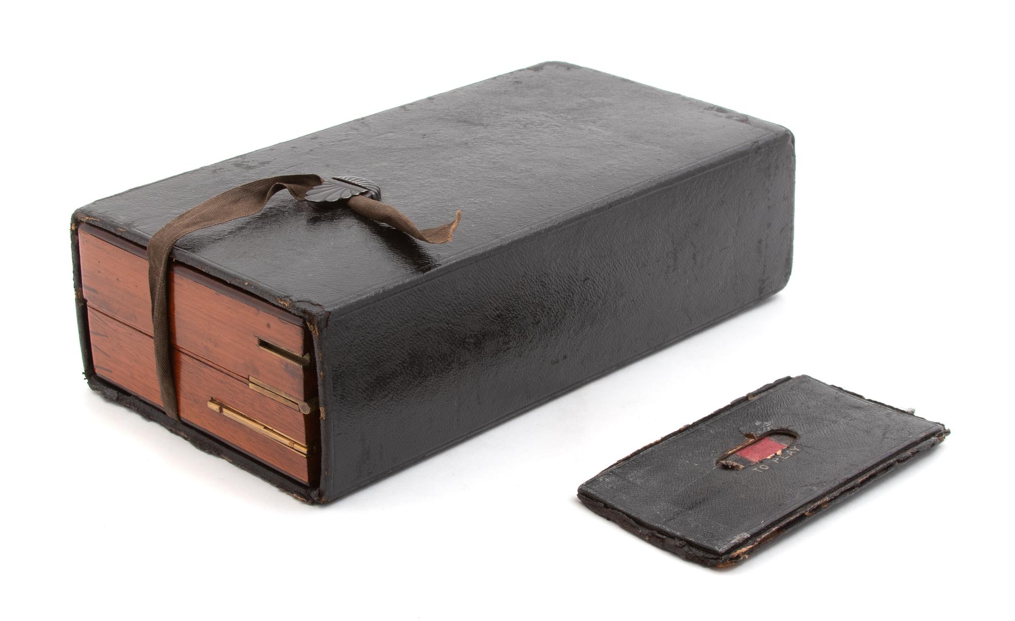 A French Chess Set in Leather Travel Case Length 10 inches. — LATE 19TH CENTURY