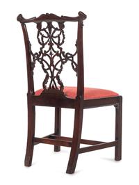 A George III Carved Mahogany Ribbon-Back Side Chair after a Design by Thomas Chippendale
