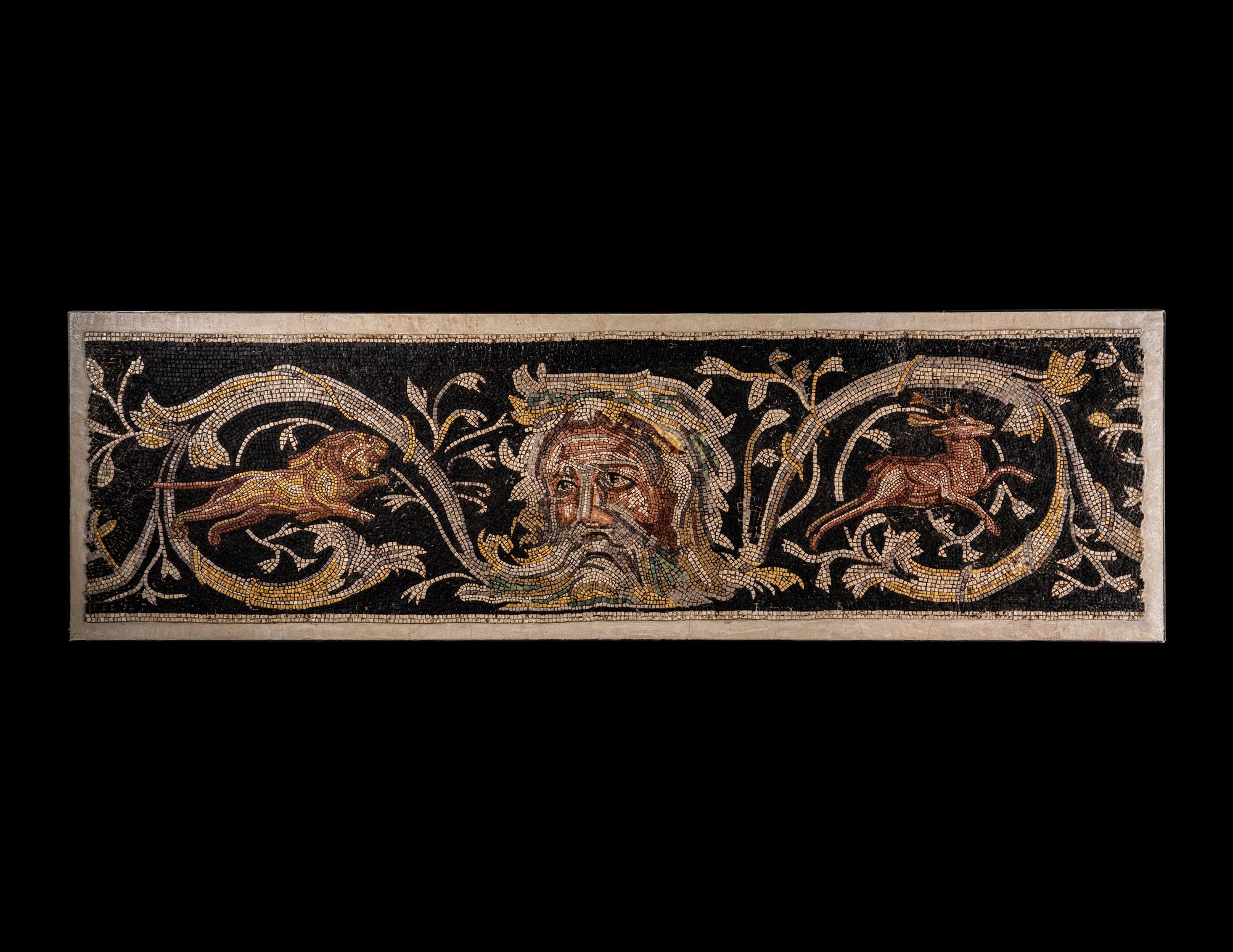 A Roman-Style Polychrome Mosaic Panel with a Bearded Head and Two Animals