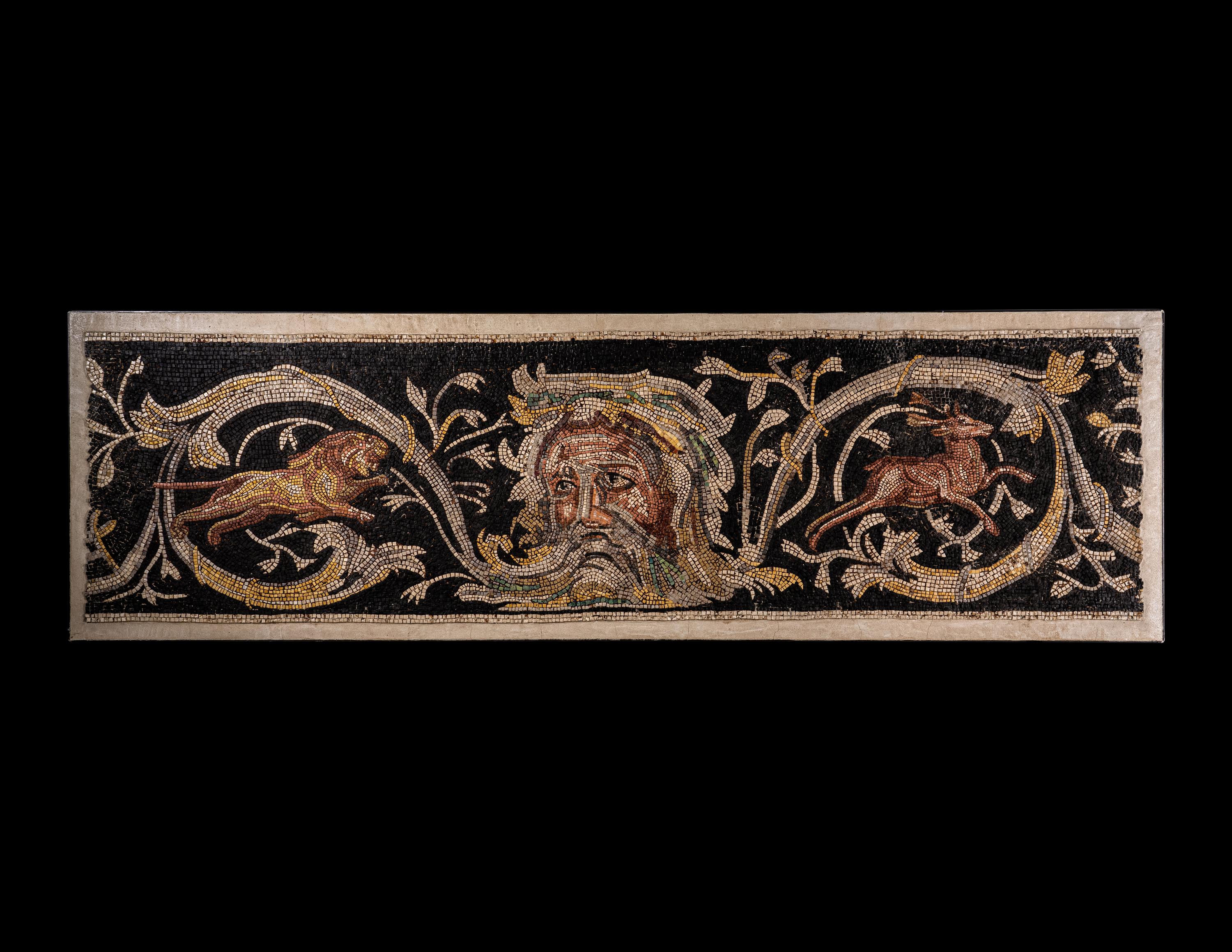 A Roman-Style Polychrome Mosaic Panel with a Bearded Head and Two Animals