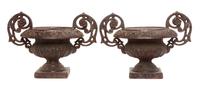 A Pair of Victorian Style Cast Iron Urns Width over handles 17 inches.