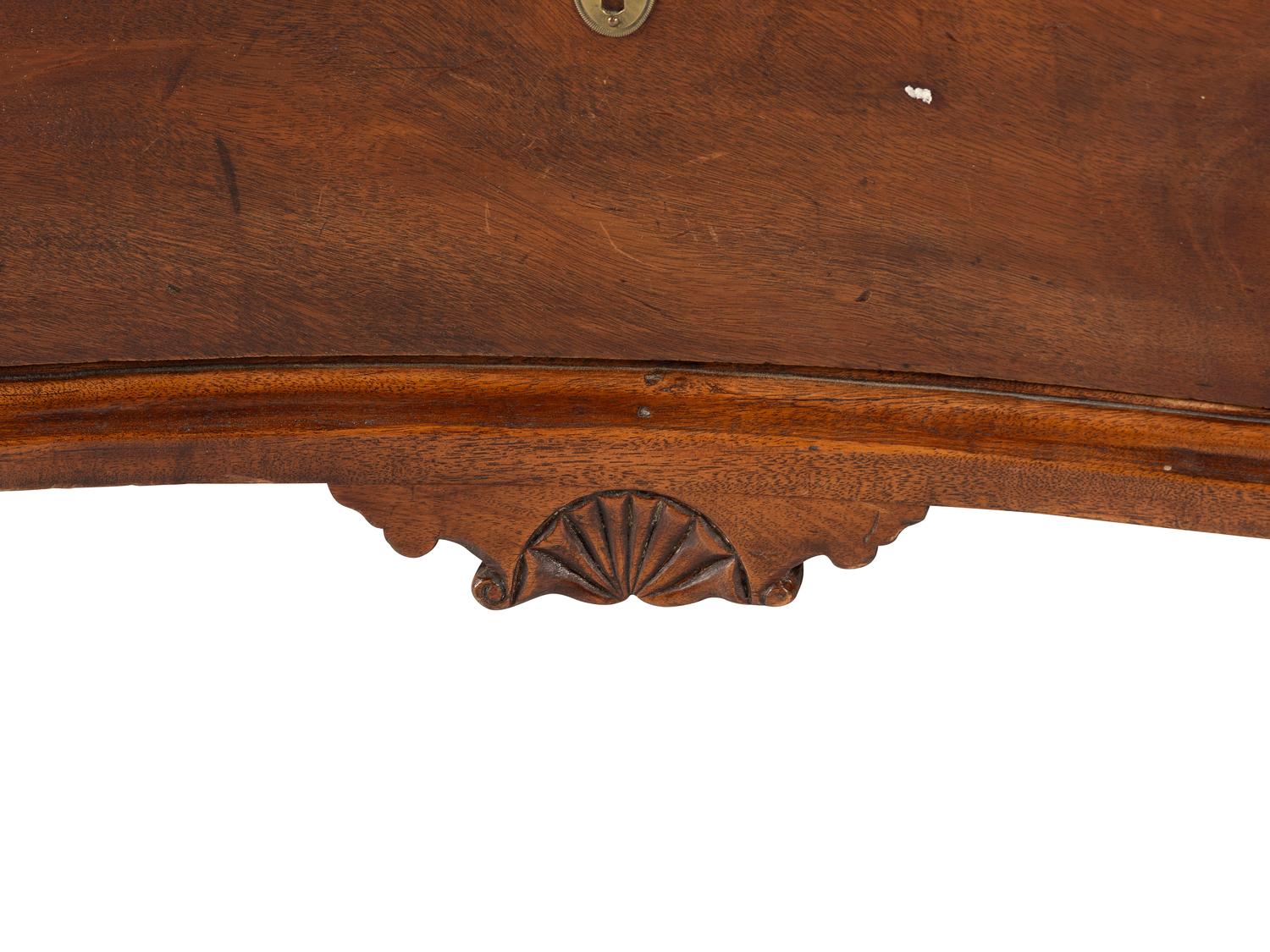 A Chippendale Mahogany and Cherrywood Serpentine Claw-and-Ball Foot Desk-and-Bookcase
