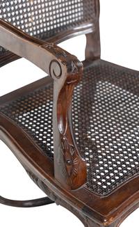 A Set of Six Louis XV Style Caned Dining Chairs