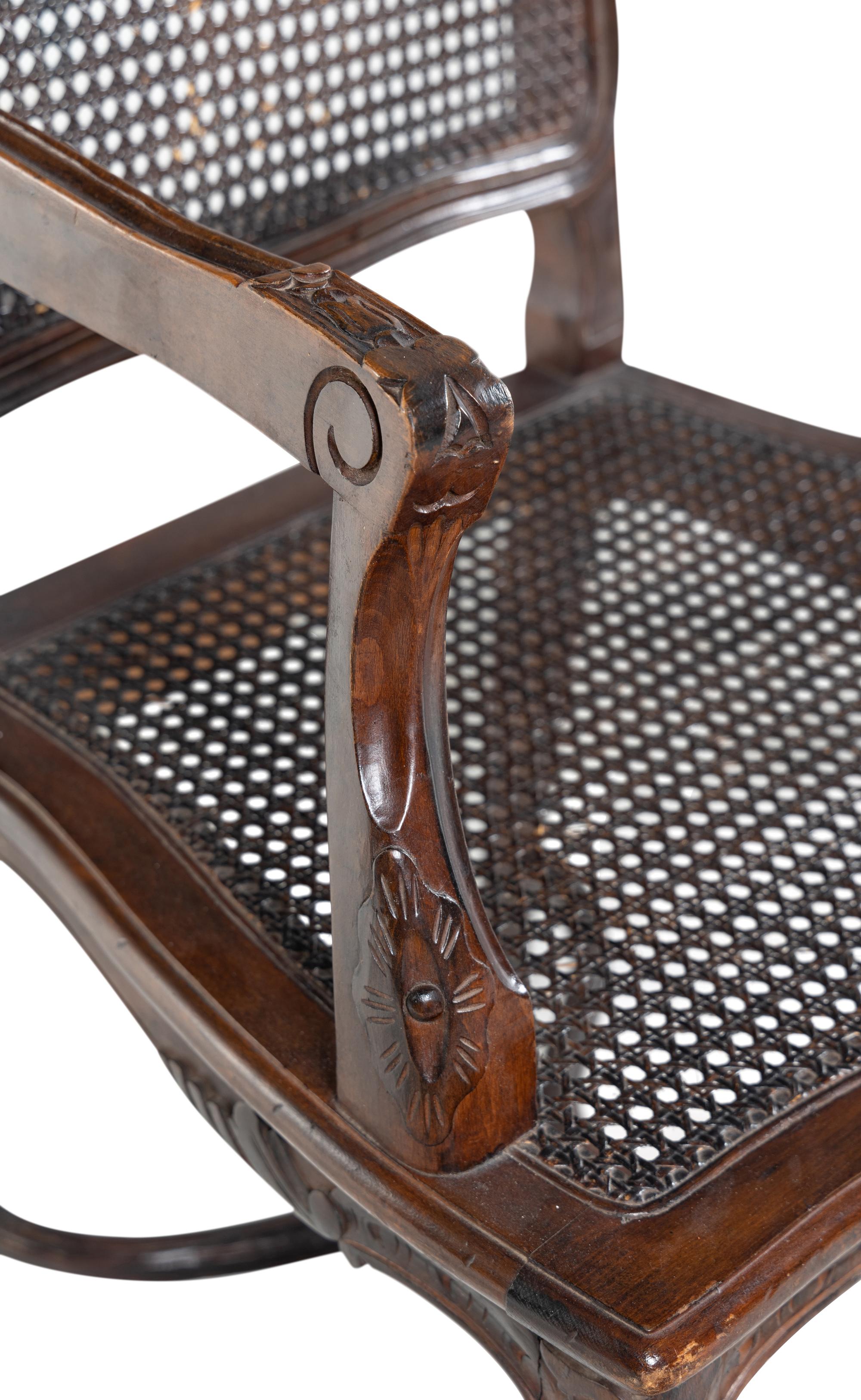 A Set of Six Louis XV Style Caned Dining Chairs