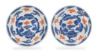 A Pair of Iron Red Decorated Underglaze Blue Porcelain Dishes Diameter of each 5 3/4 inches. — GUANGXU PERIOD (1875-1908)