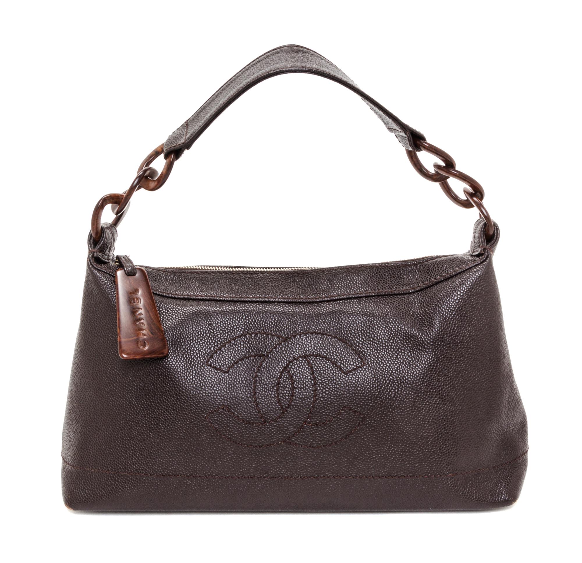 A Chanel Brown Caviar Leather Handbag, 14" x 8" x 5".