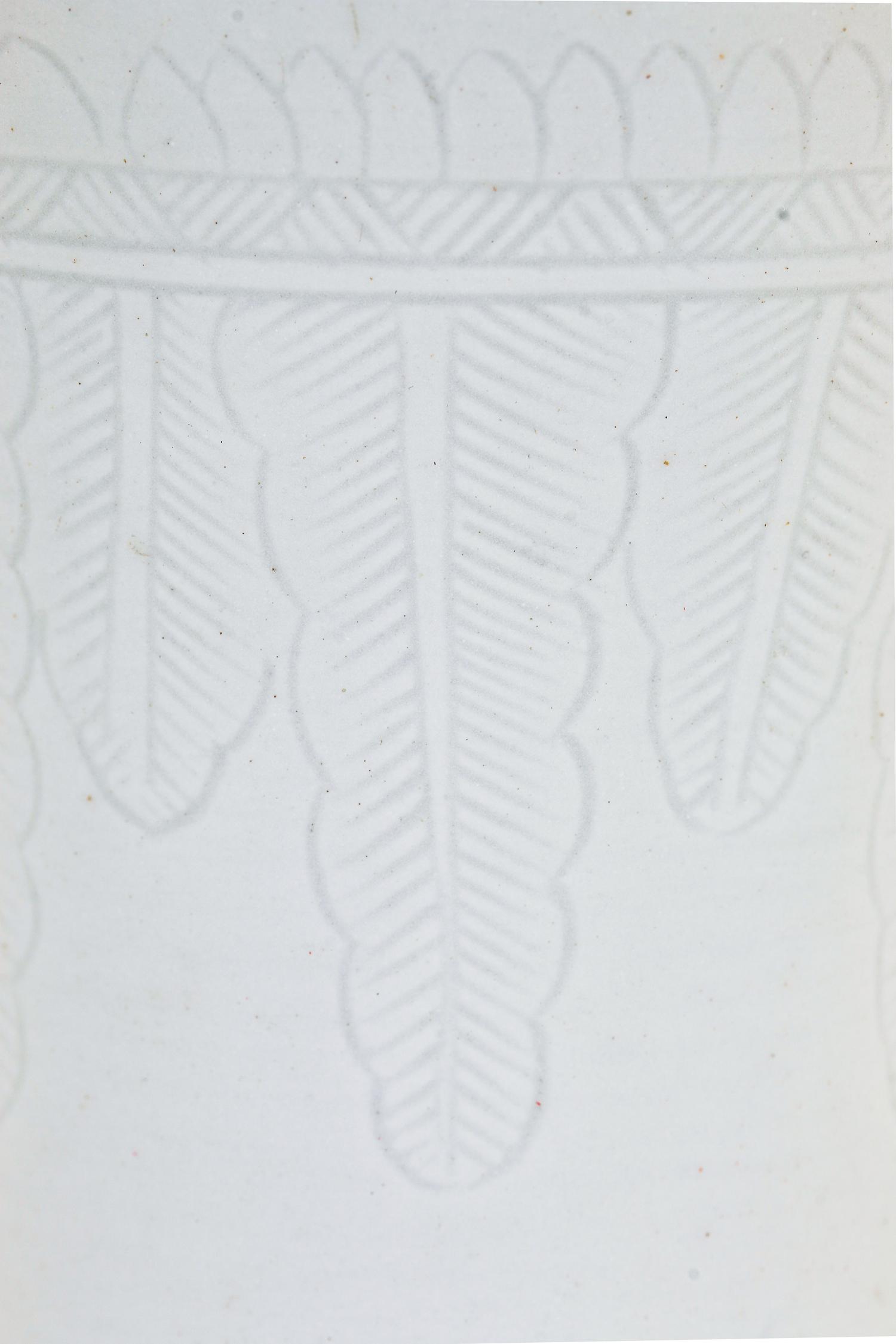Two White Glazed Anhua Decorated Vases
