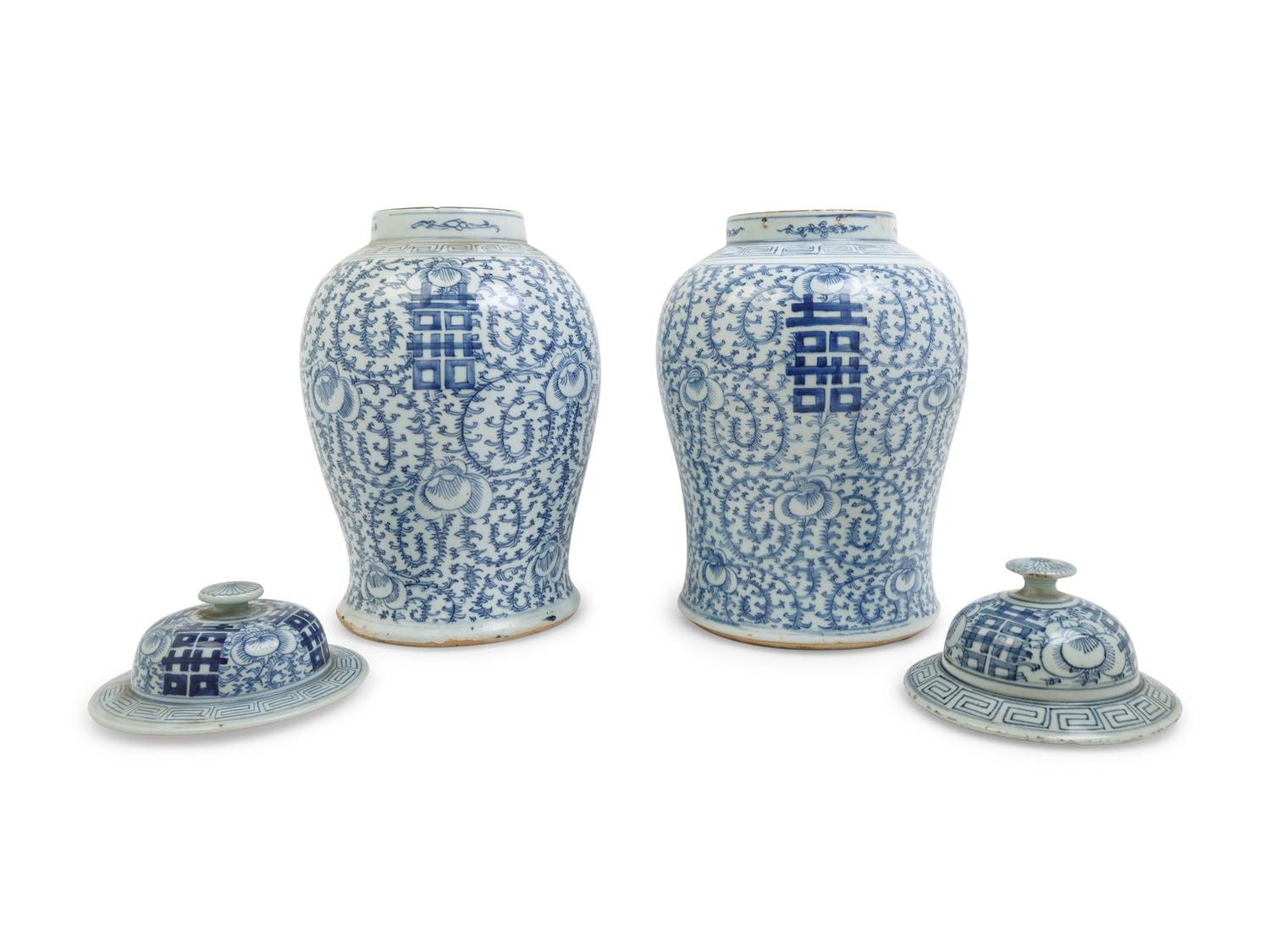 A Pair of Chinese Blue and White Porcelain Jars and Covers