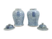 A Pair of Chinese Blue and White Porcelain Jars and Covers
