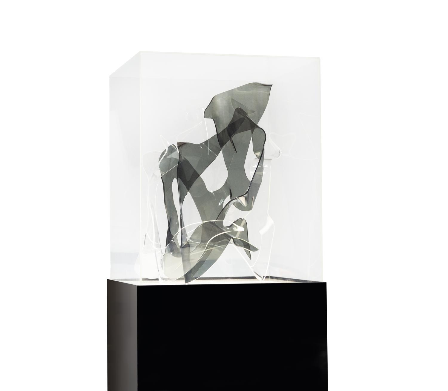 Sculpture and Lighted Pedestal