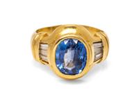 An 18 Karat Yellow Gold Sapphire and Diamond Ring,
