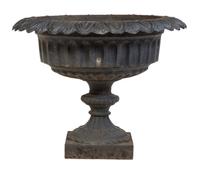 A Victorian Cast Iron Jardiniere Height 28 x diameter 34 inches.